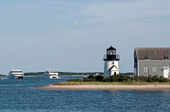 Harbor Lighthouse Guides Ferry Boats in Cape Cod